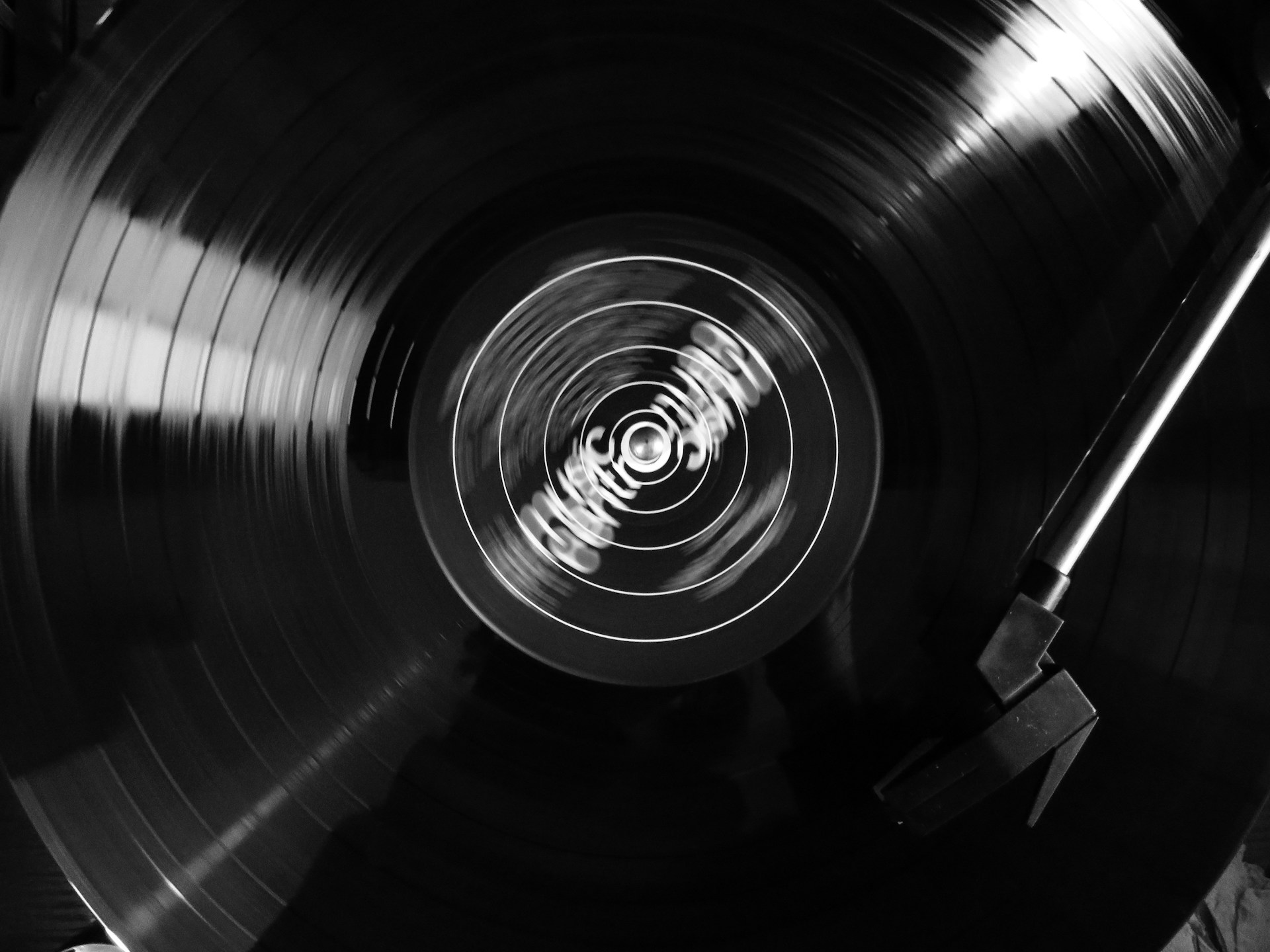 a black and white photo of a record