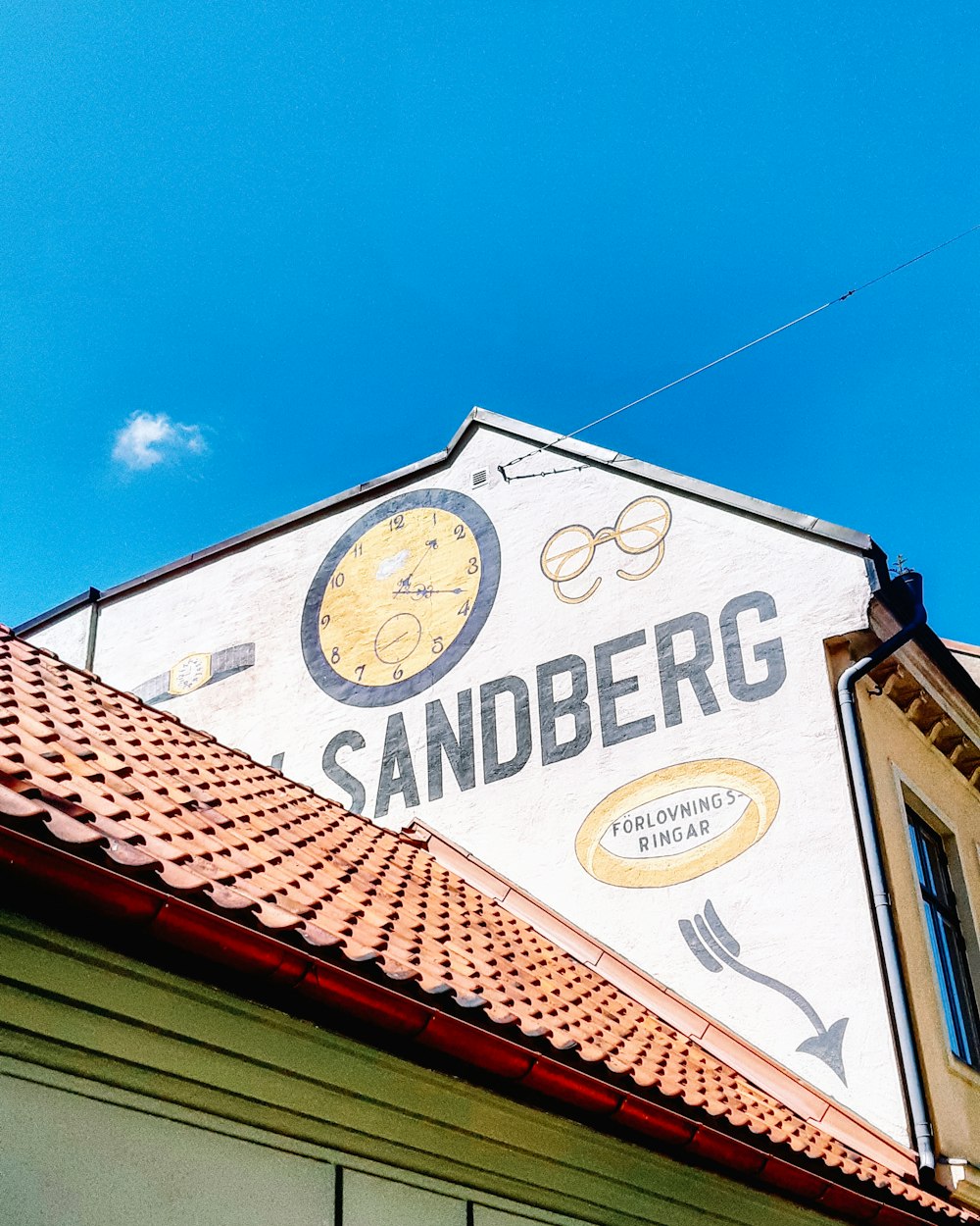 a building with a clock on the side of it