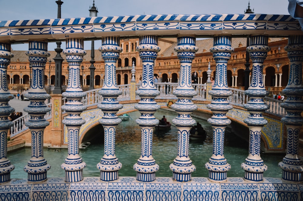 a bridge that has a bunch of blue and white designs on it