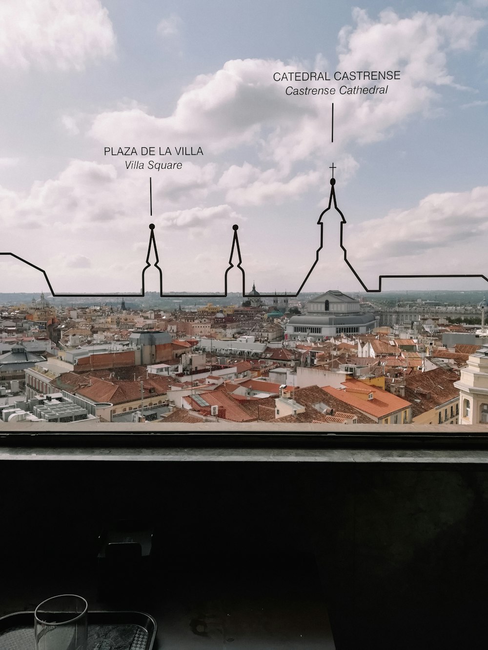 a view of a city from a train window