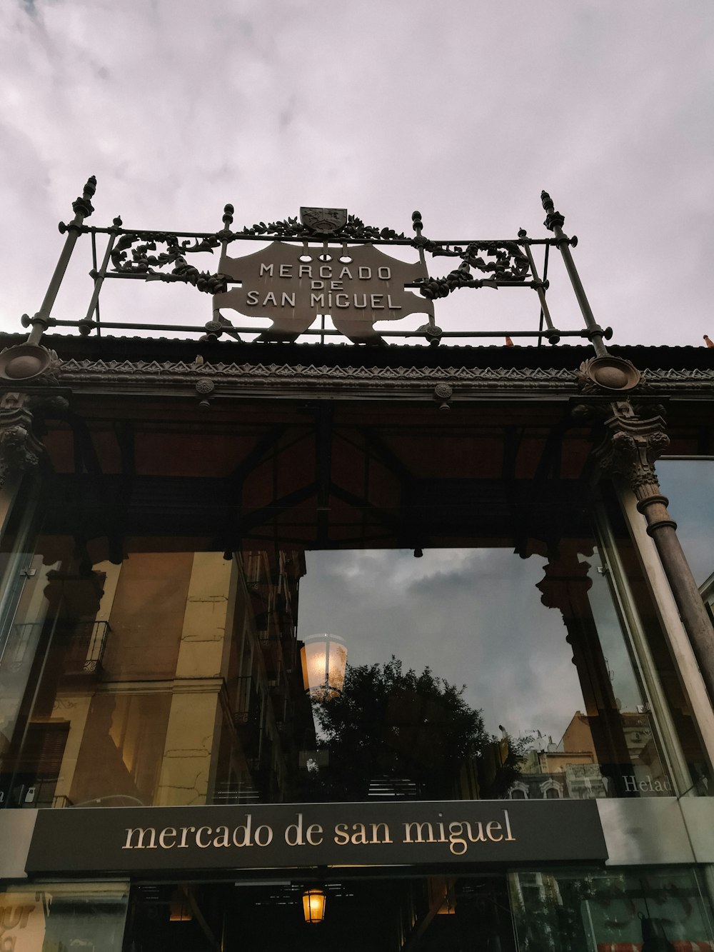 a building with a sign that says mercado de san miguel