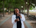 a woman holding a pair of scissors in her hands