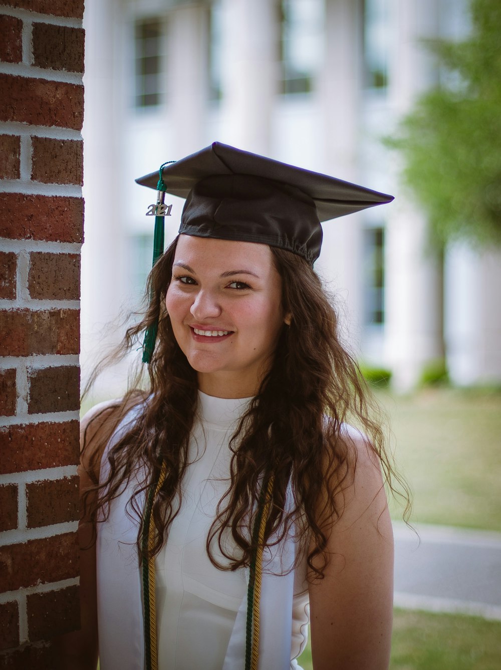 a woman wearing a graduation cap and gown