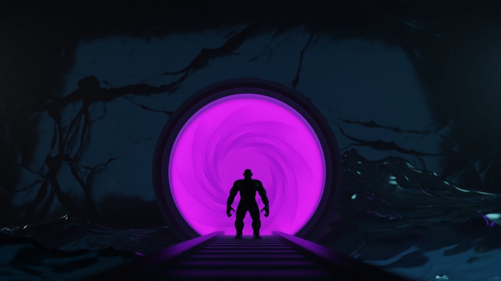 a man standing in front of a purple tunnel