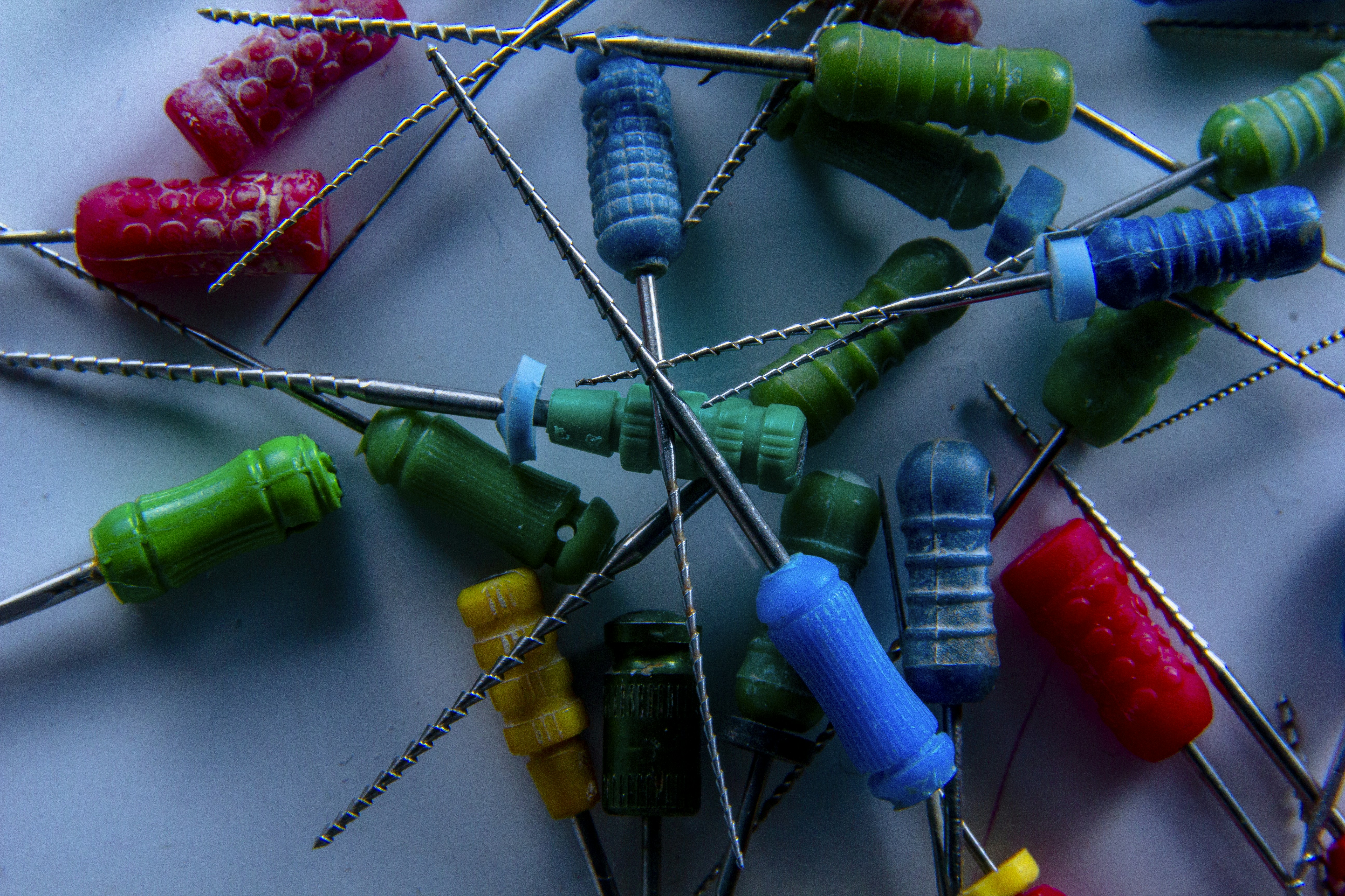 a bunch of colorful toothpicks sitting on top of each other