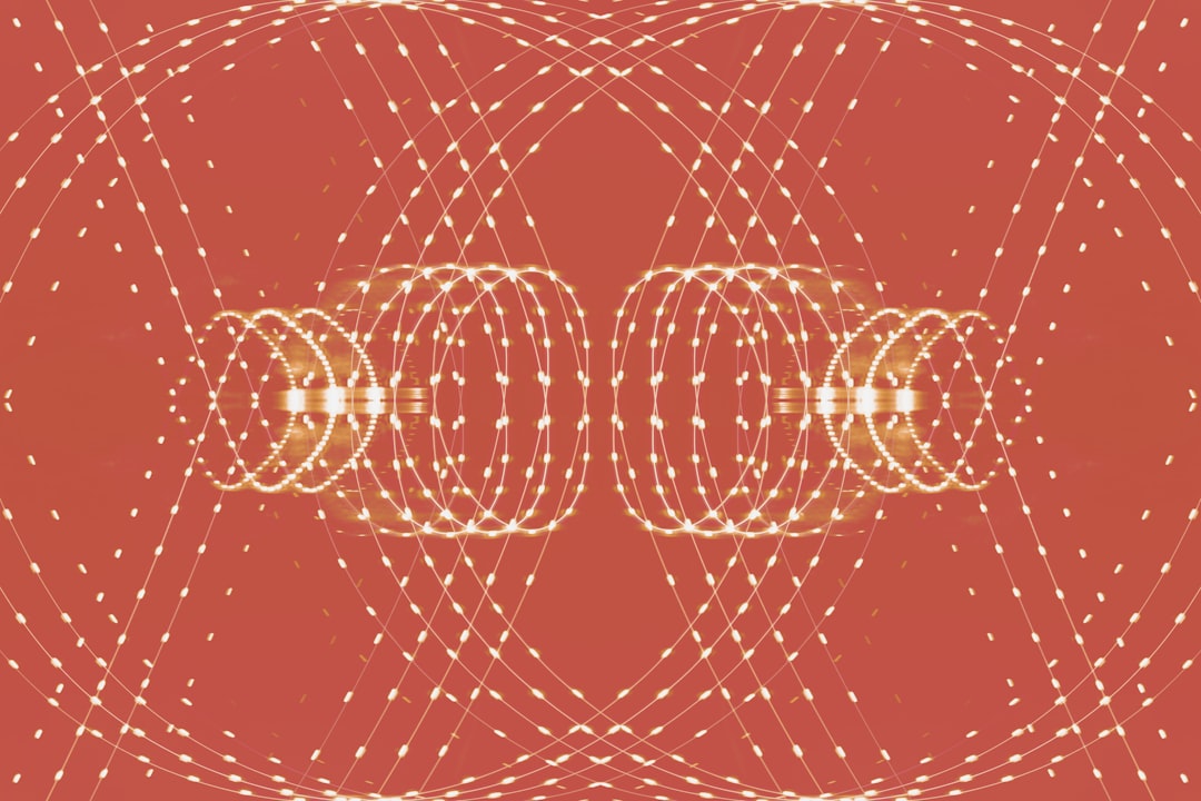 a red background with circles and dots,