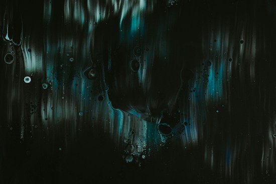 Dark abstract artwork featuring fluid, flowing patterns with subtle circular elements. Shades of deep green, black, and hints of teal or blue create a mysterious ambiance.