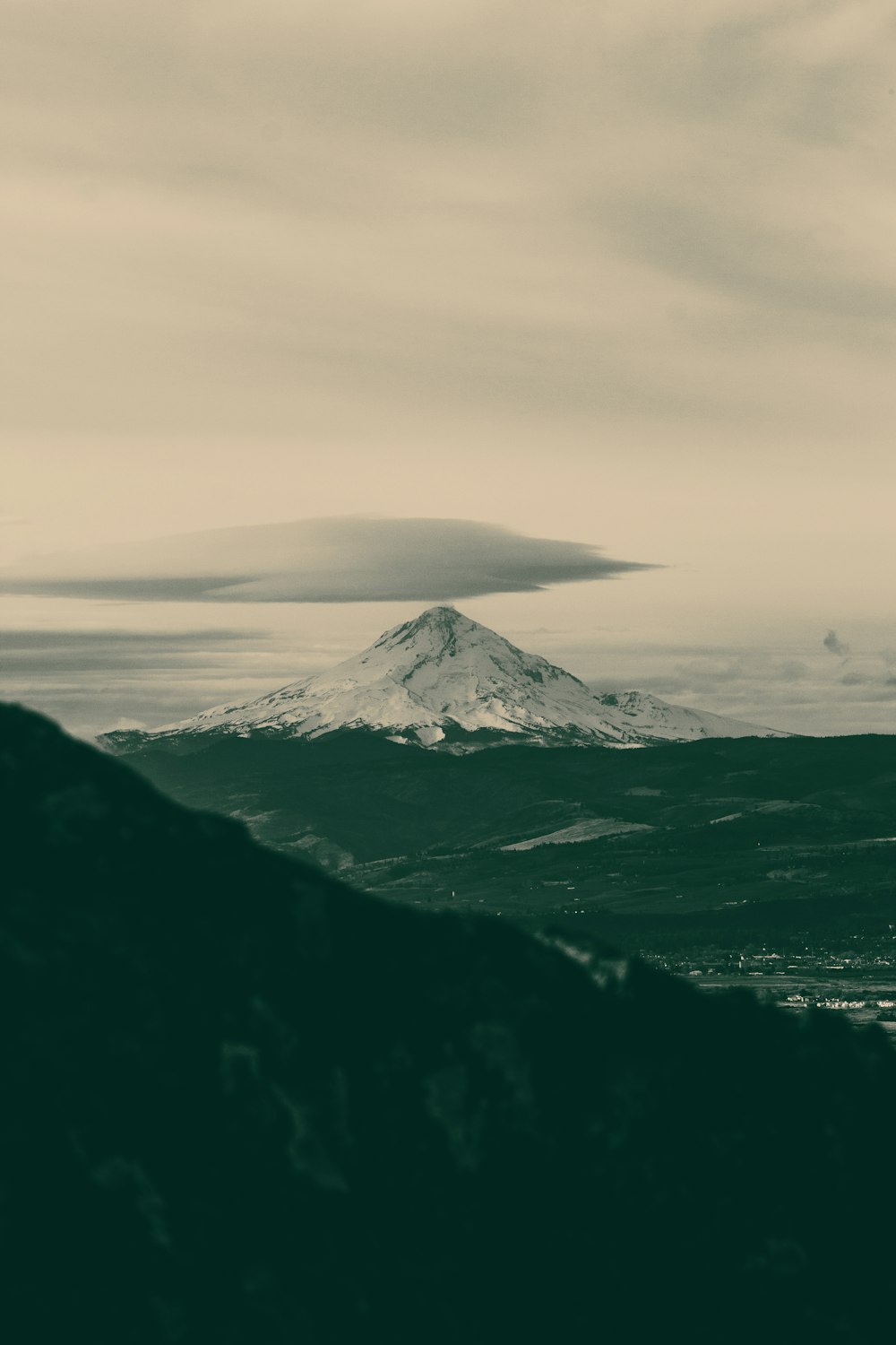 a black and white photo of a mountain