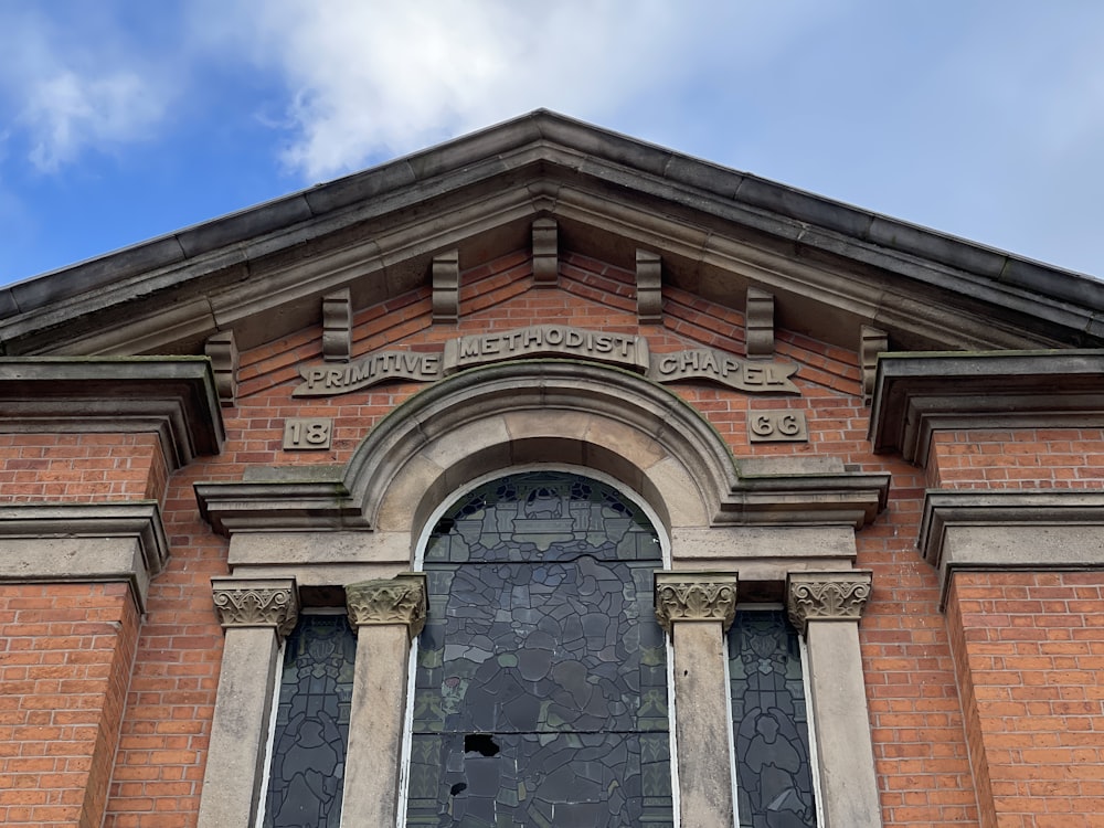 a church with a clock on the side of a building