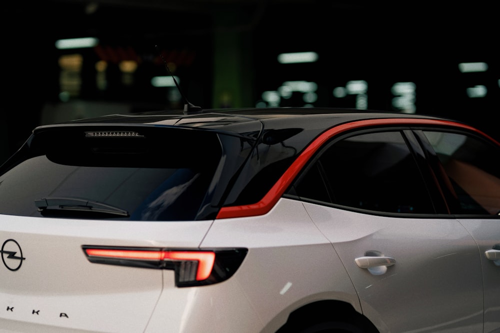 a white car parked in a parking garage