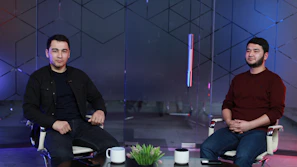 Photo of a stylish interview with Zelu Home founders in a modern studio.