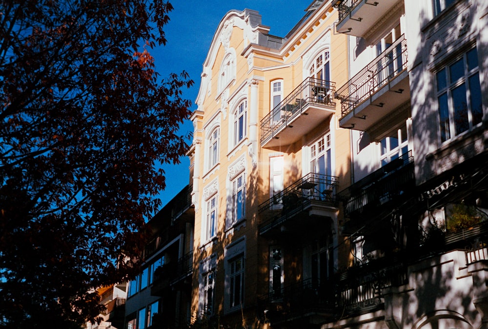 a tall building with balconies and balconies on the balconies