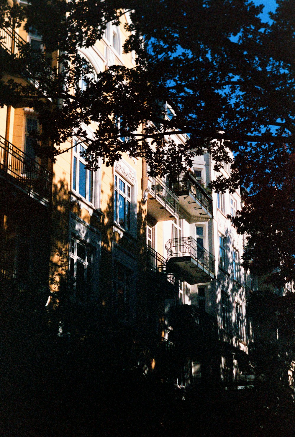 a tall building with balconies and balconies on the balconies