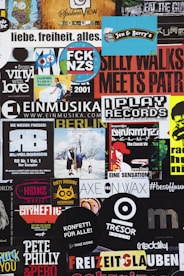 a collage of various stickers on a wall