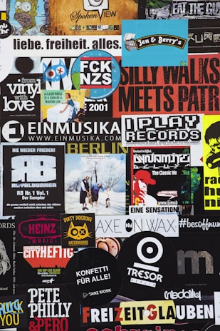a collage of various stickers on a wall