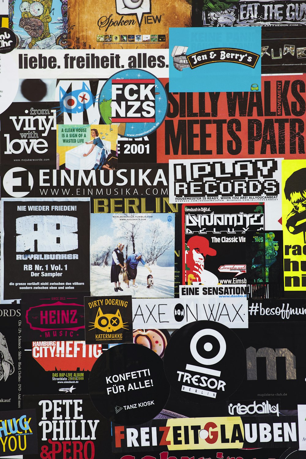 a collage of various stickers on a wall