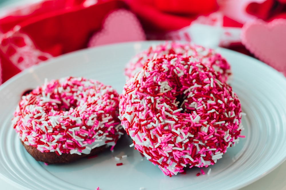 a couple of doughnuts that are on a plate