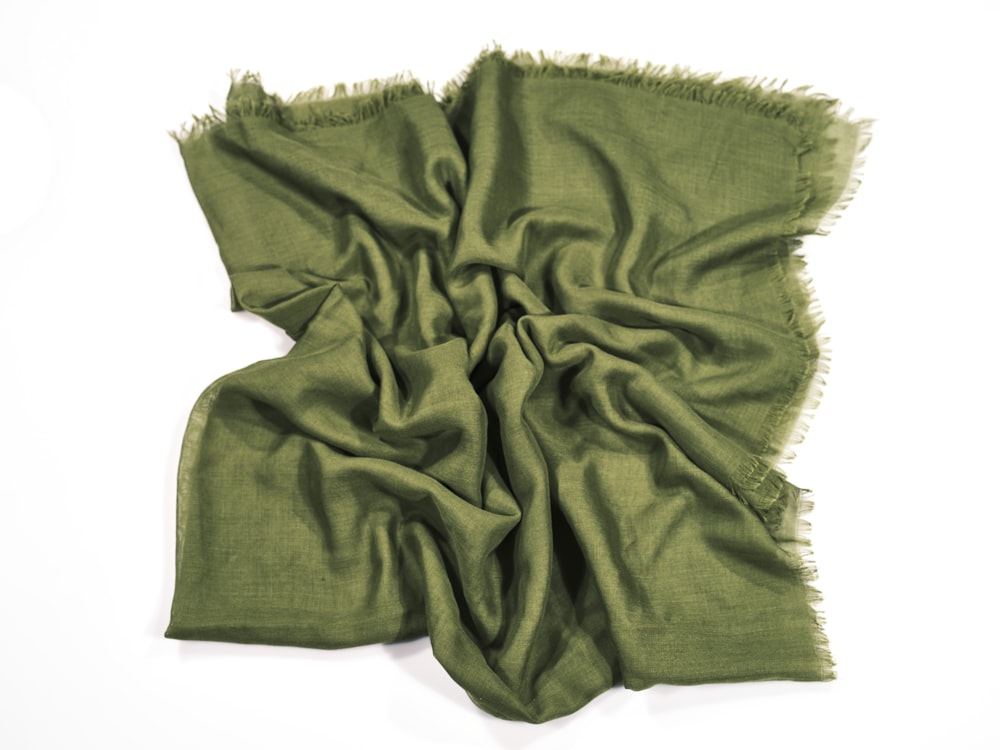 a green scarf on a white background