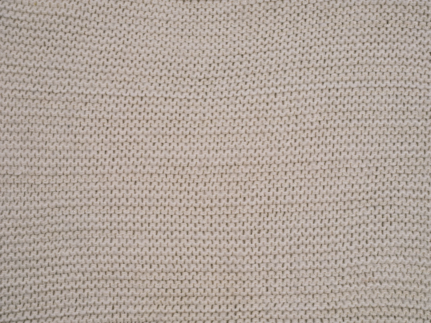 Côtes du tricot écru, gros plan