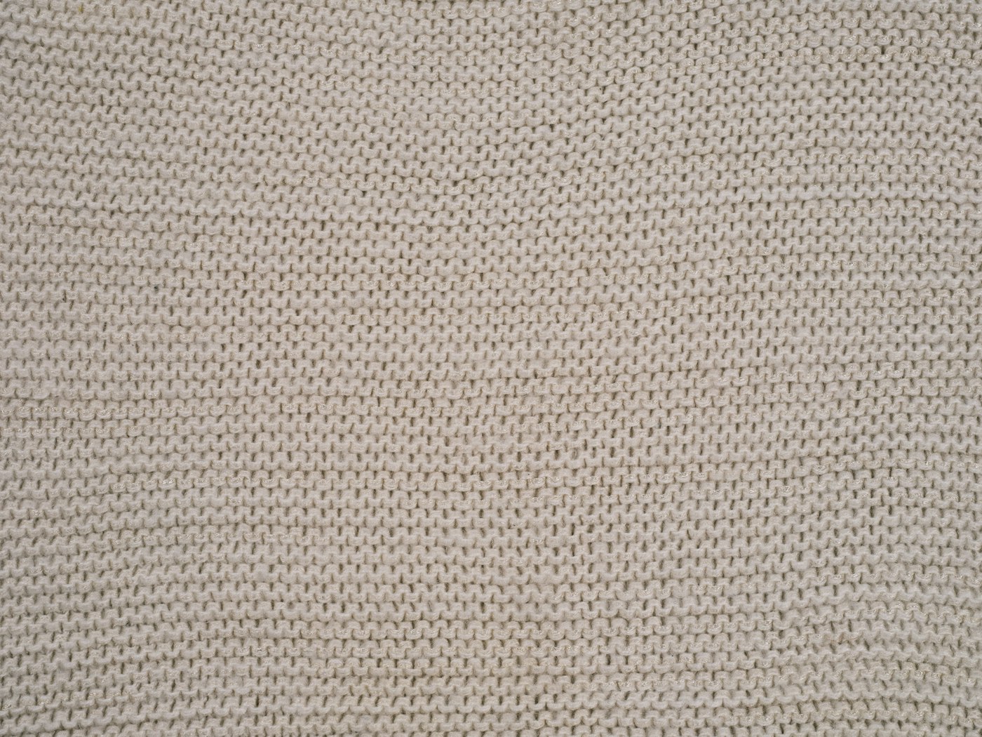 Côtes du tricot écru, gros plan
