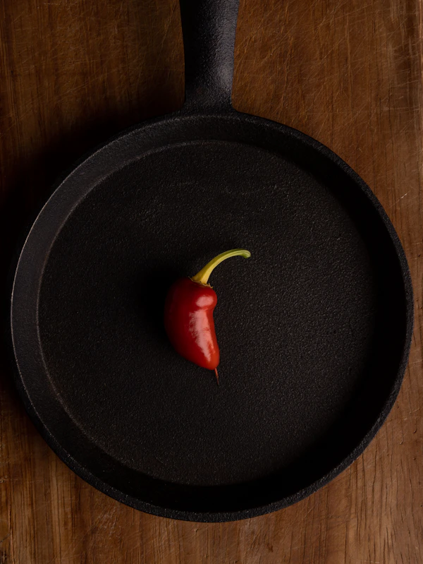 Rubbing oil over a cast iron pan