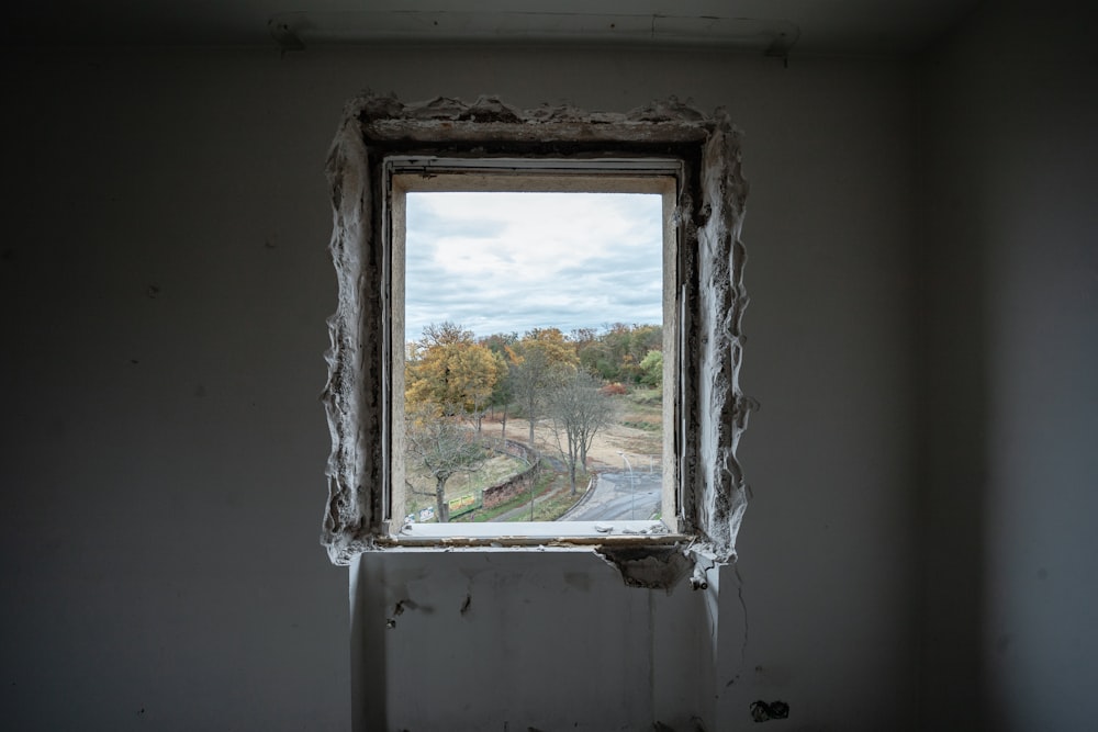 a window in a room with a view of trees