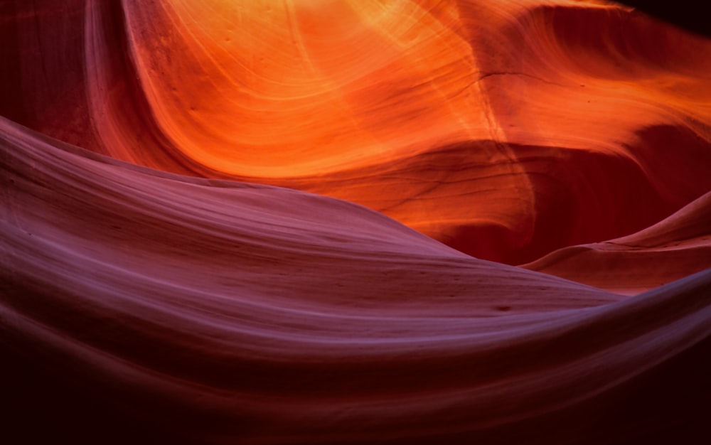 a red and orange rock formation in the desert