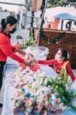 a woman in a red shirt and a little girl in a red shirt