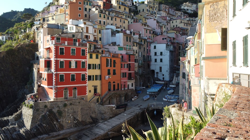 a group of buildings on the side of a hill