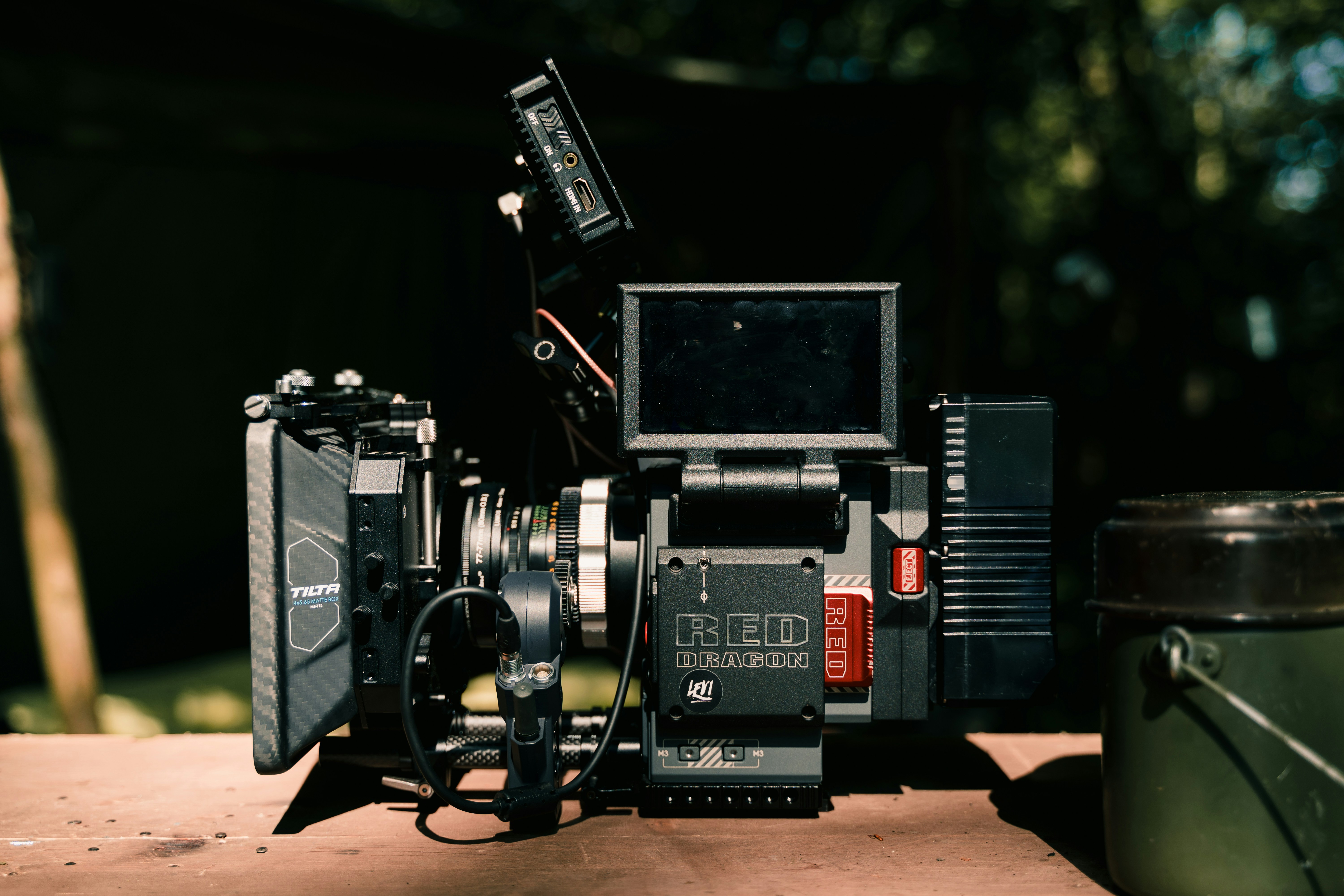 a camera sitting on top of a wooden table