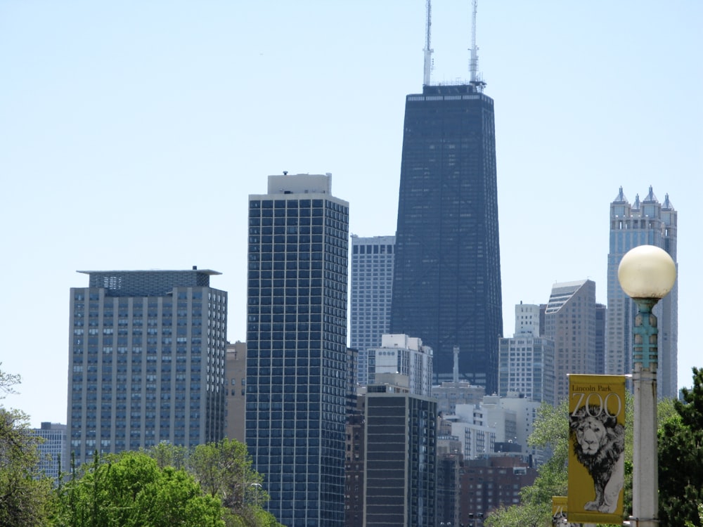 a view of a city with tall buildings in the background