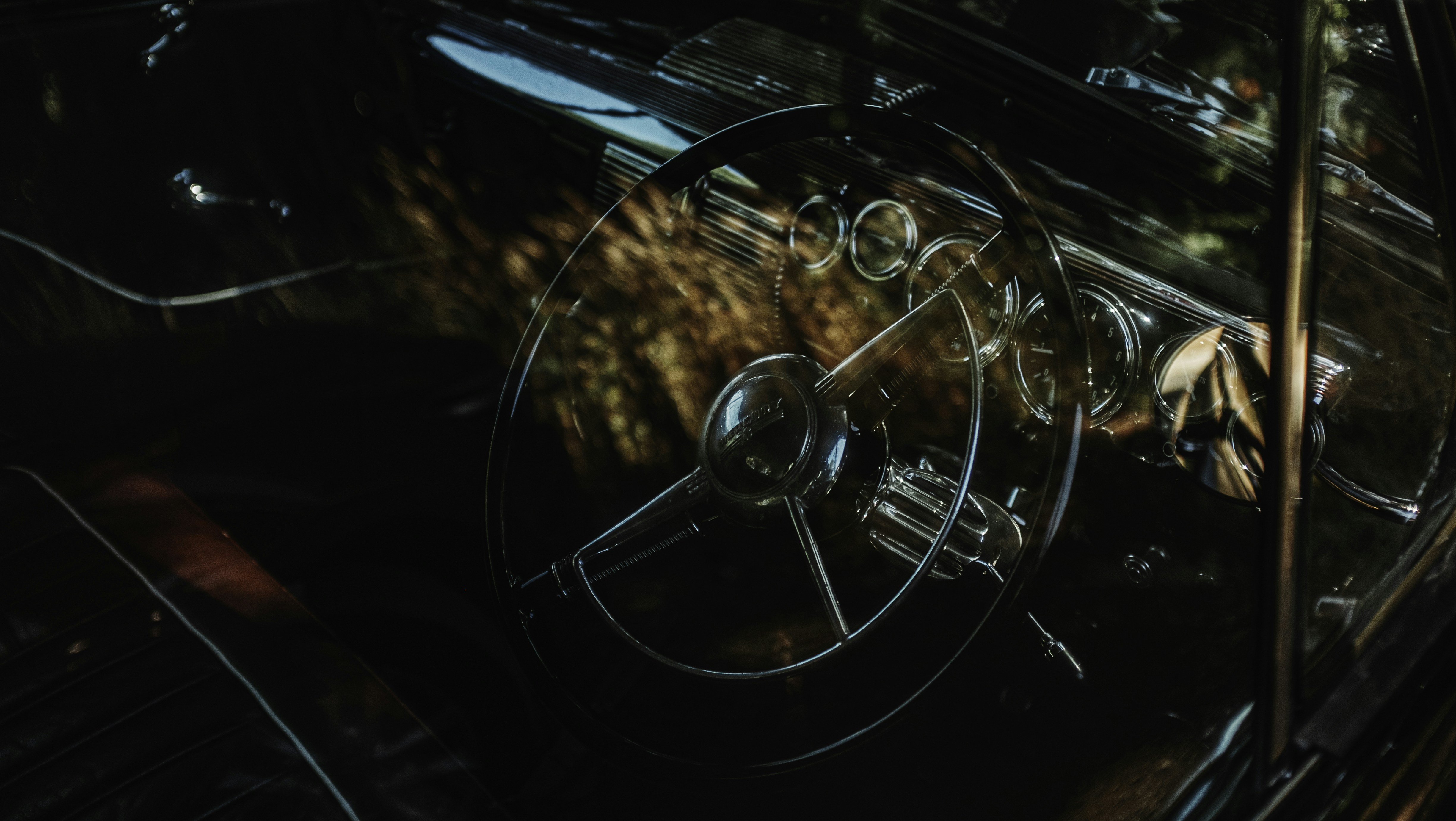 a close up of a steering wheel on a car