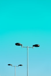 a couple of street lights sitting next to each other