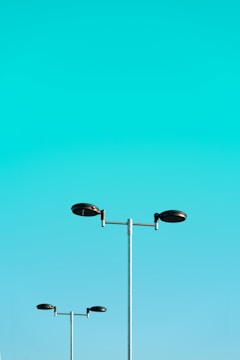 a couple of street lights sitting next to each other