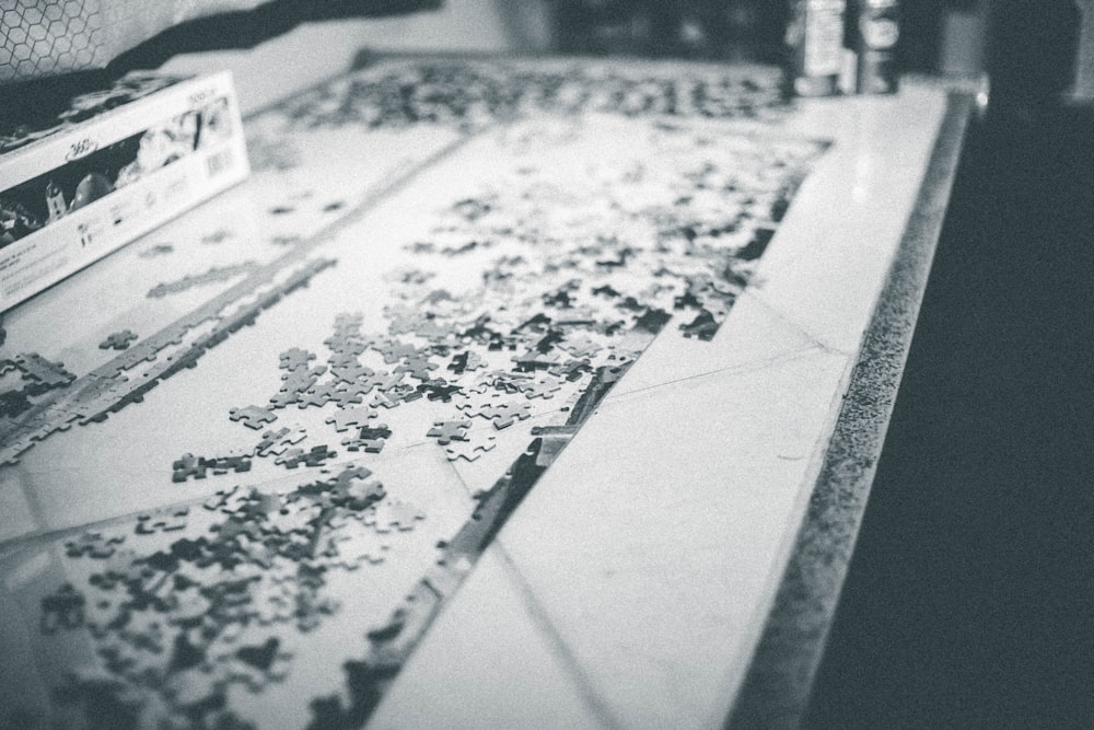 a close up of a counter top with flowers on it