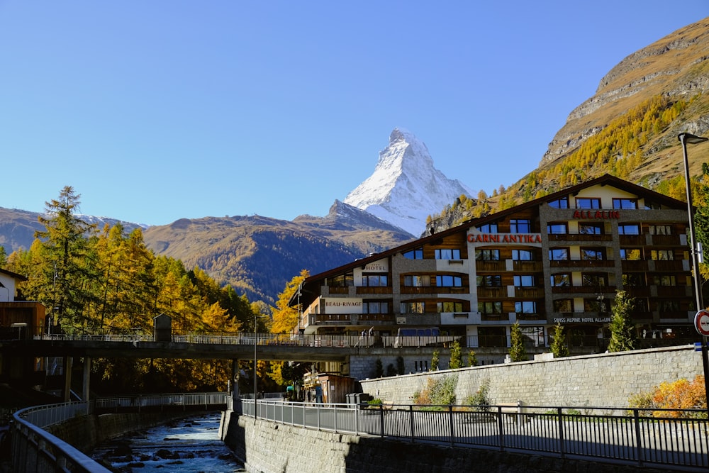 a building with a mountain in the background