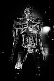 a black and white photo of a robot
