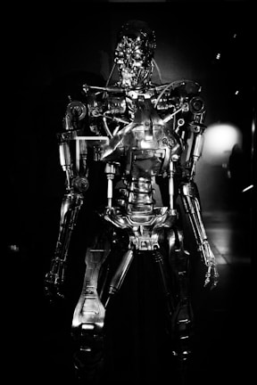 a black and white photo of a robot