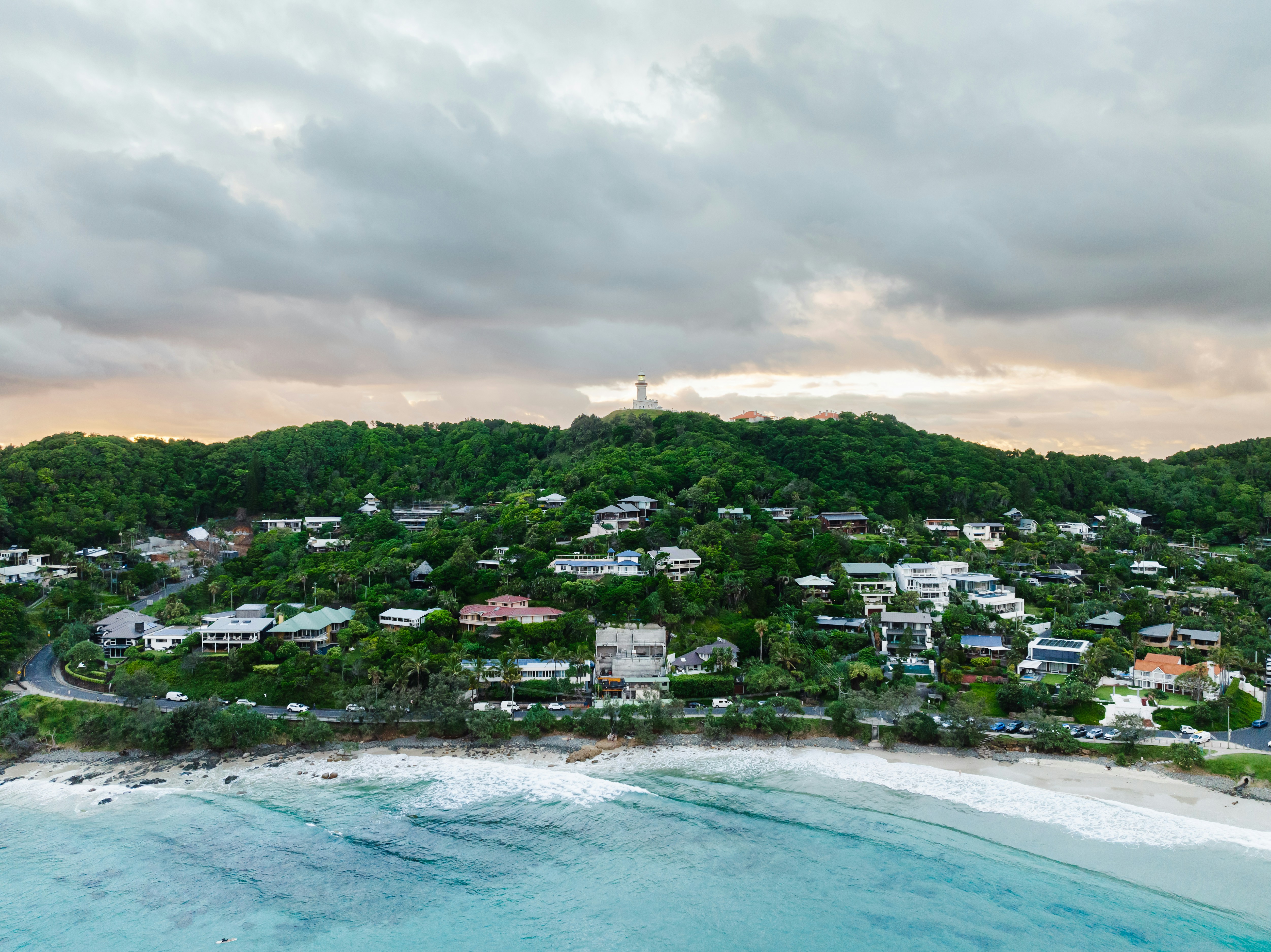 an aerial view of a small town on a beach