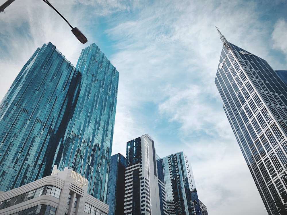 a group of tall buildings next to each other