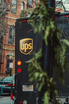 a ups bus parked on the side of the road