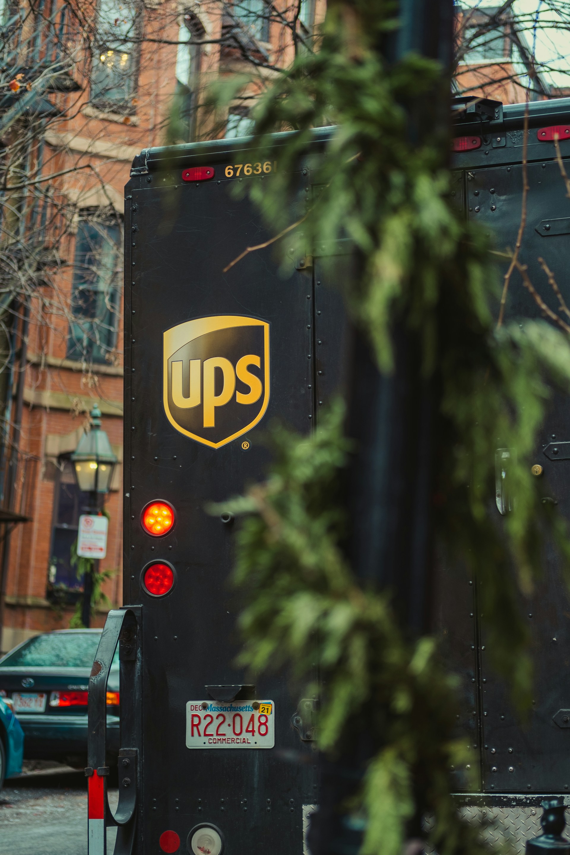 a ups bus parked on the side of the road