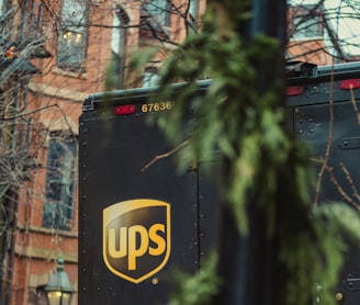 a ups bus parked on the side of the road