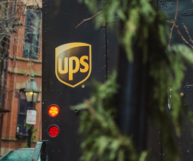 a ups bus parked on the side of the road