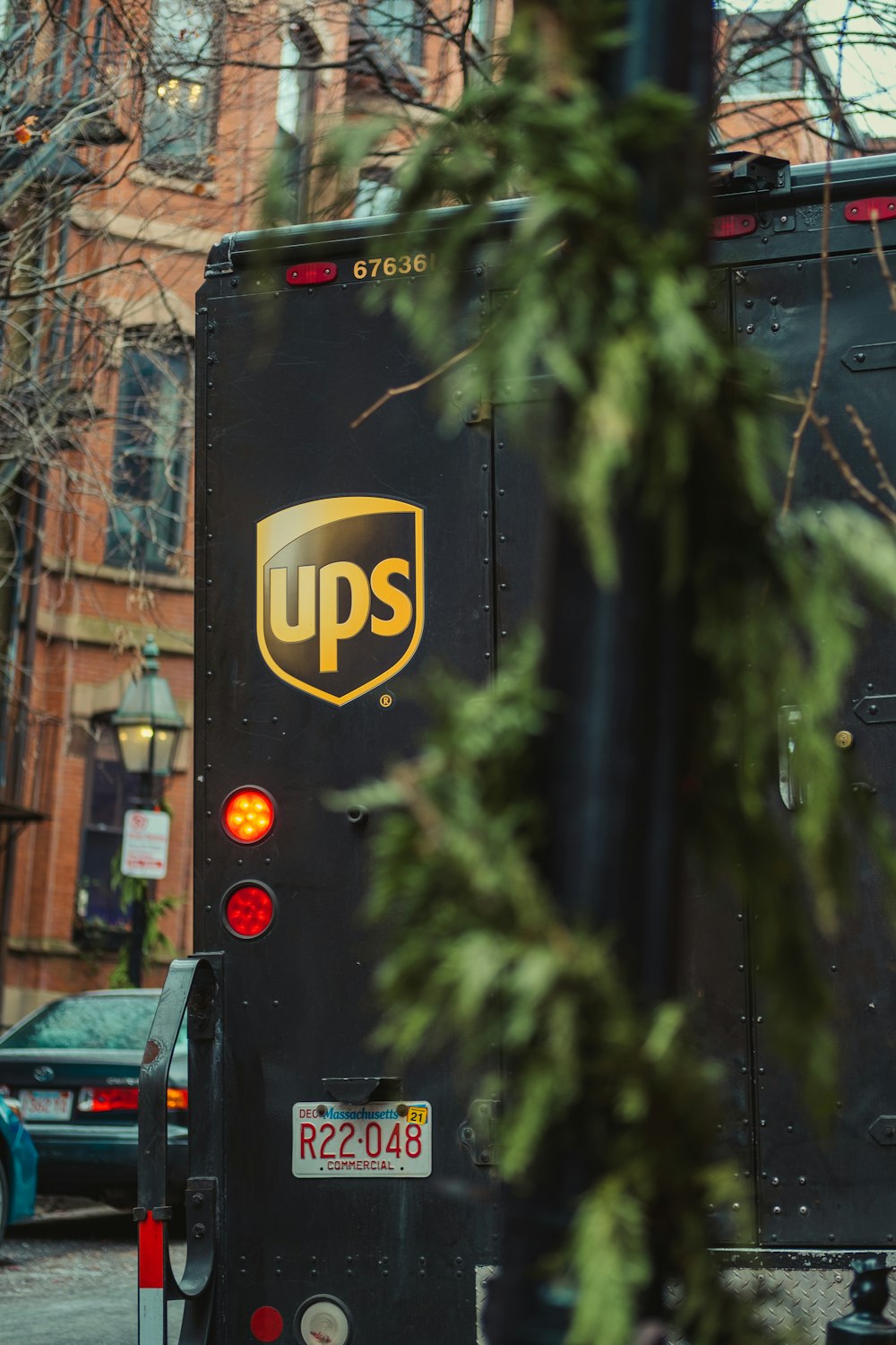 a ups bus parked on the side of the road