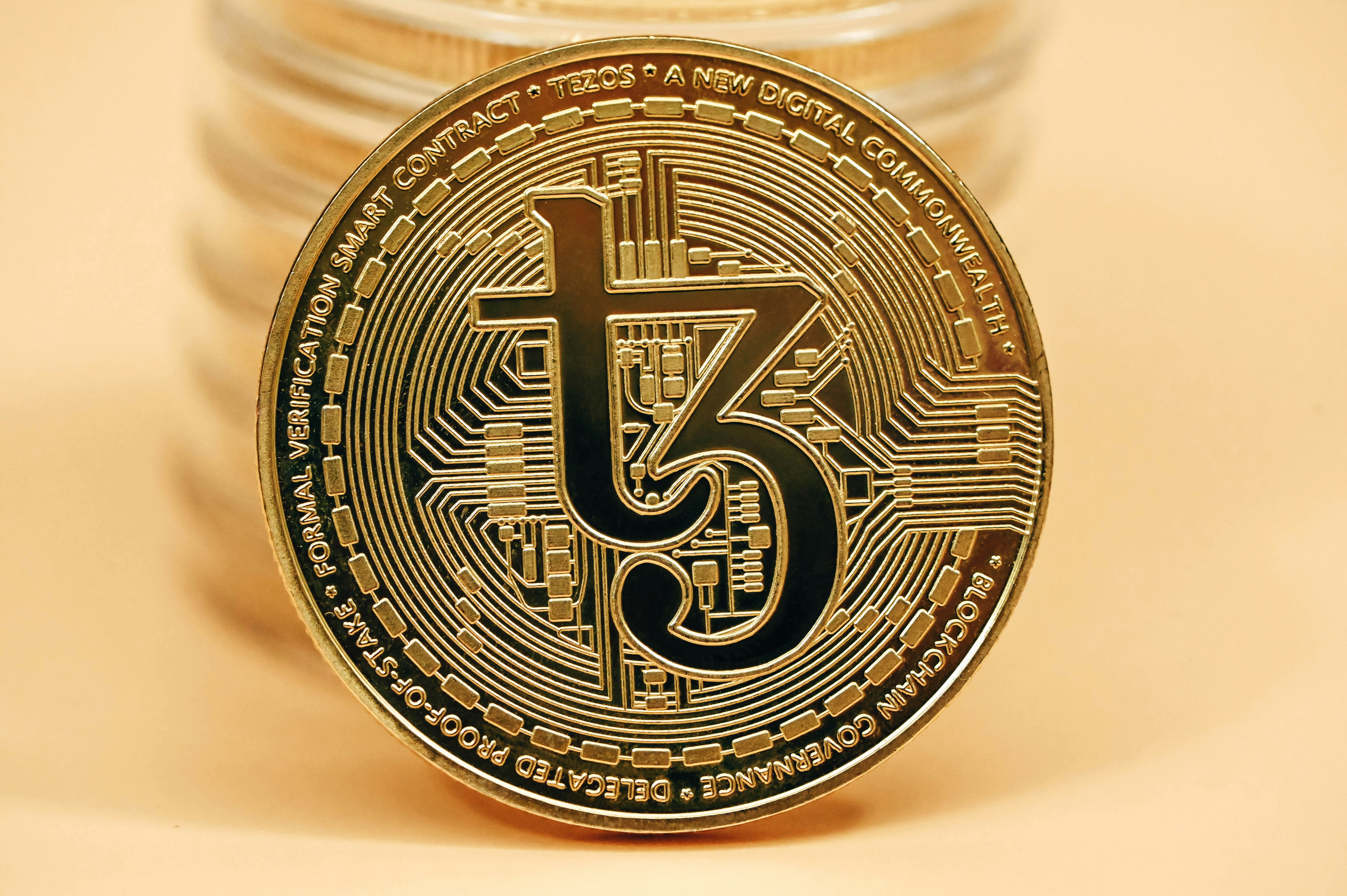 Close-up of a Tezos coin