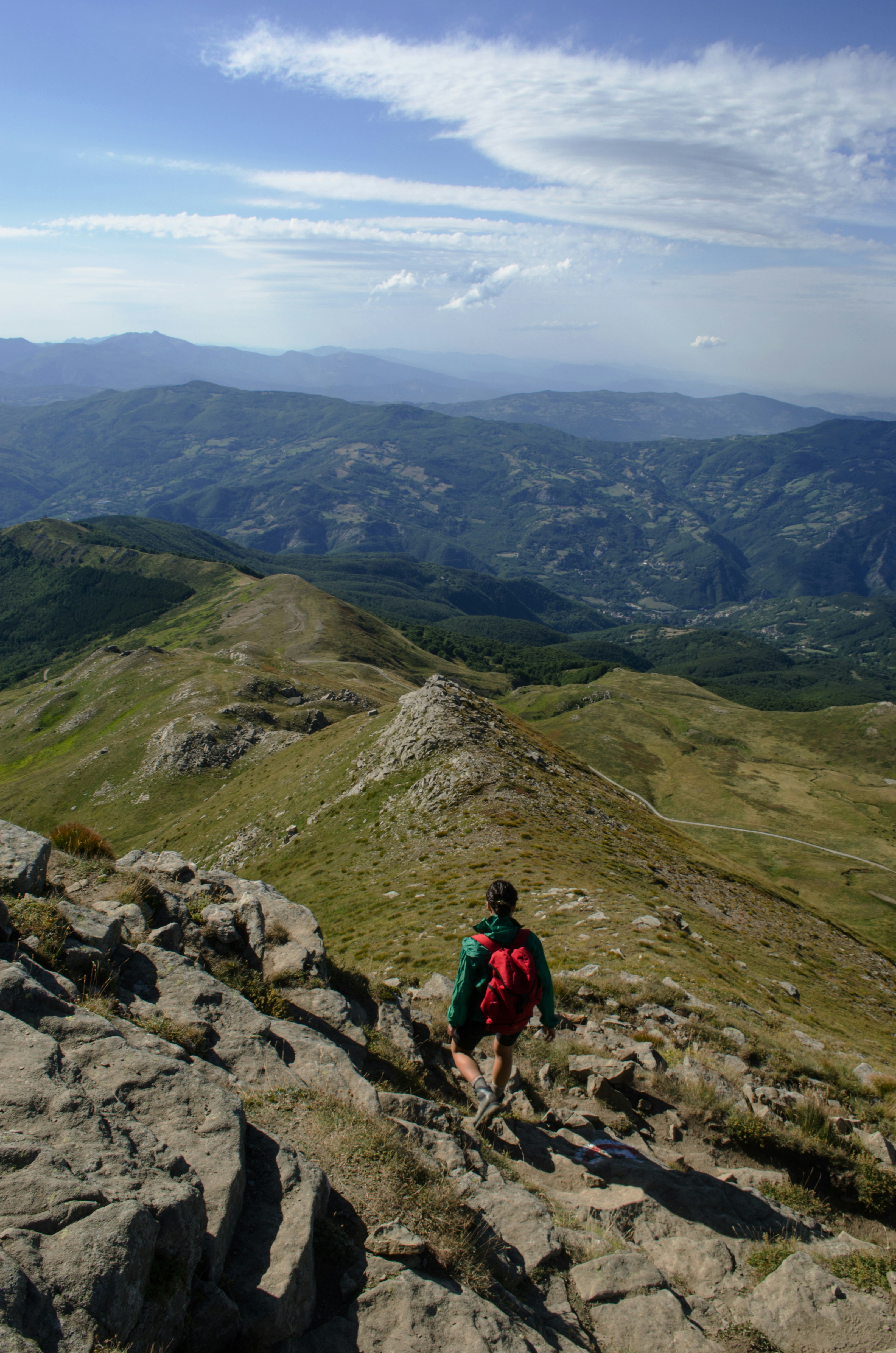 a man hiking up the side of a mountain