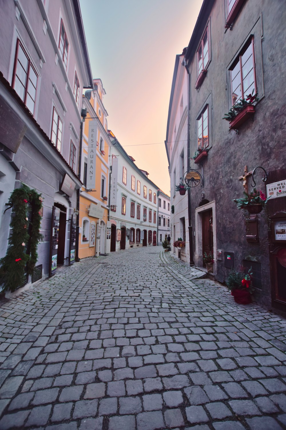 a cobblestone street in a european city