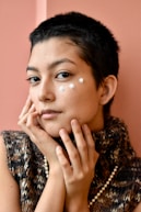 a woman with a white spot on her face