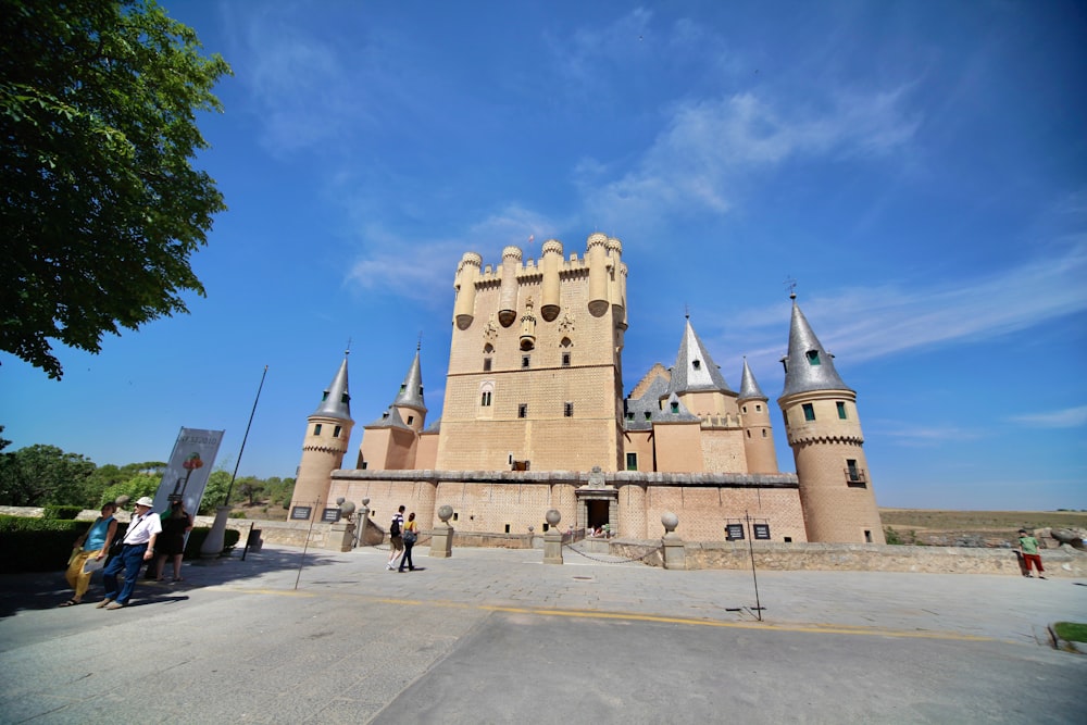 a large castle with a lot of towers on top of it